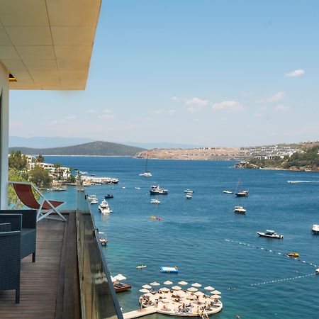 Cape Bodrum Luxury Hotel & Beach Gündoğan Exterior foto View of the bay from the hotel